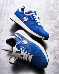 STRAUSS Canberra Steel Toe Work Shoe in Gentian blue shown in use on the job