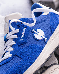 Close-up of the Gentian blue Canberra Steel Toe Work Shoe upper, laces, and steel toe area