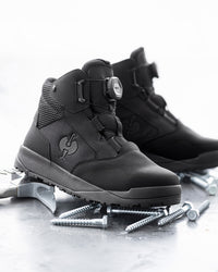 STRAUSS Murcia 6-inch Steel Toe Work Boot in Black with workwear in a jobsite scene