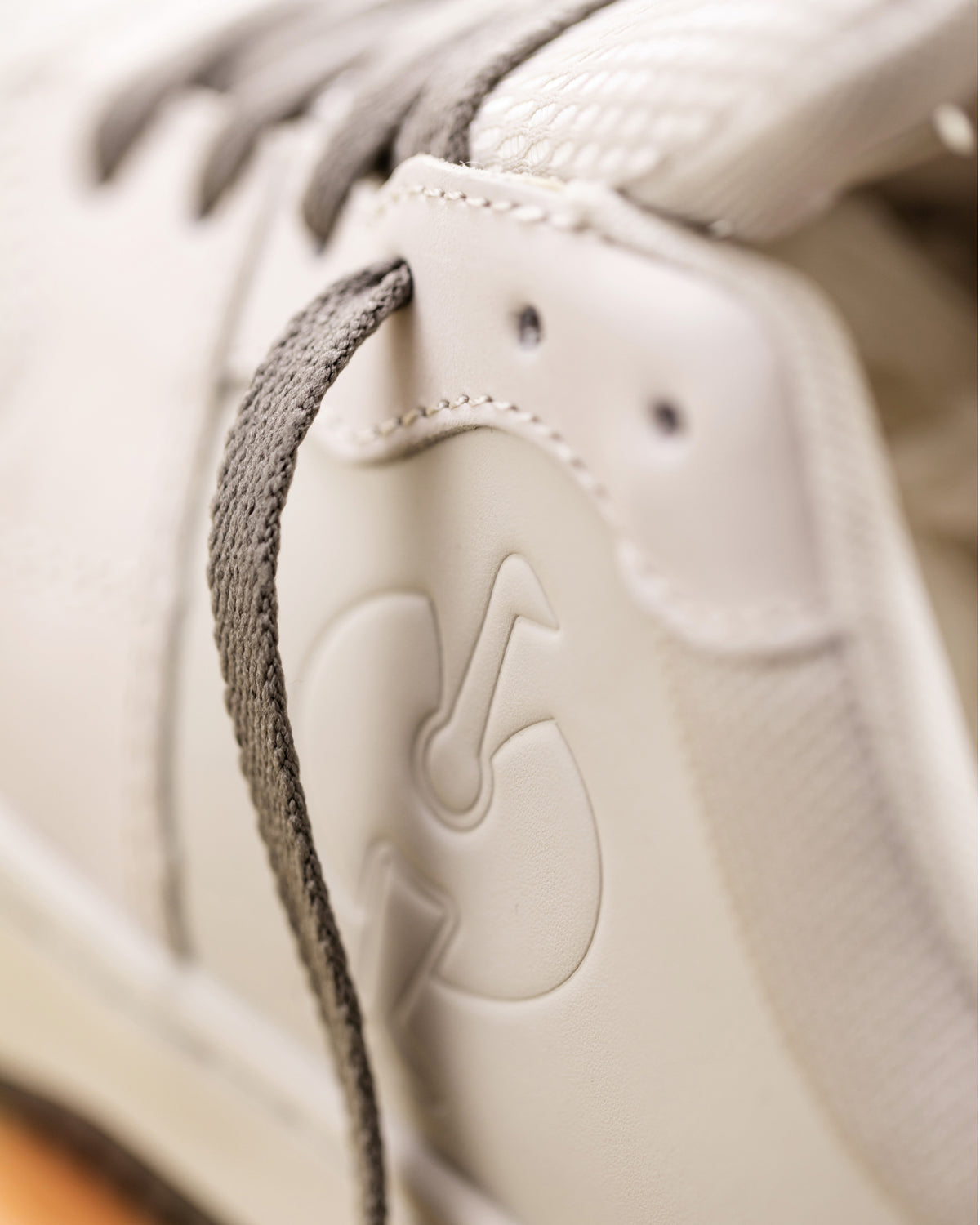 STRAUSS Eindhoven Steel Toe Work Shoe in Cream stone and Gray shown in use on the job
