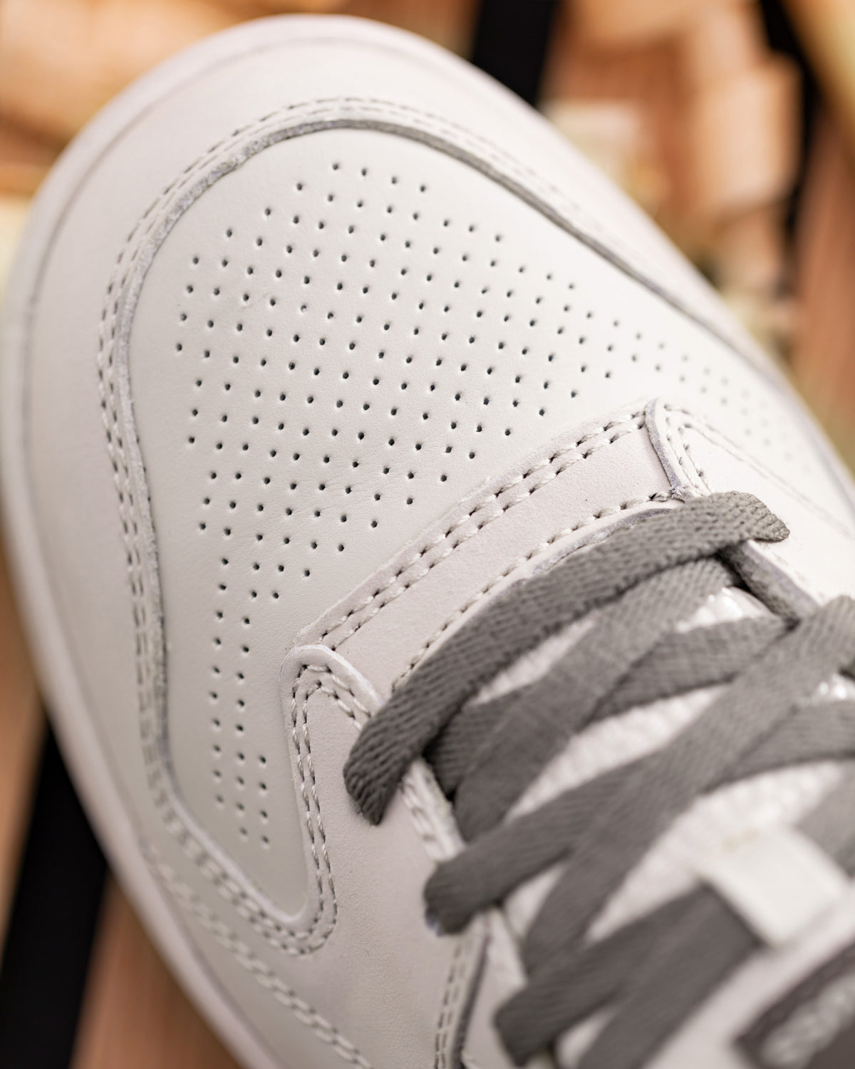 Close-up of the Cream stone and Gray Eindhoven Steel Toe Work Shoe steel toe area