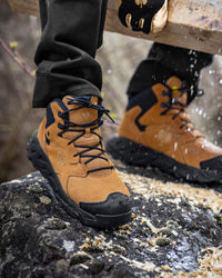 STRAUSS Turin 6-inch Aluminum Toe Work Boot in Almond brown shown on rough jobsite ground