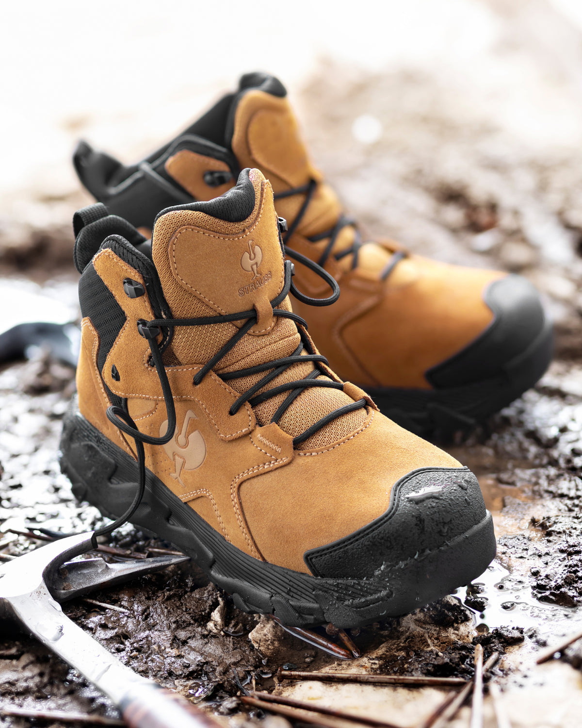 STRAUSS Turin 6-inch Aluminum Toe Work Boot in Almond brown worn in an outdoor work setting
