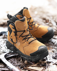STRAUSS Turin 6-inch Aluminum Toe Work Boot in Almond brown worn in an outdoor work setting