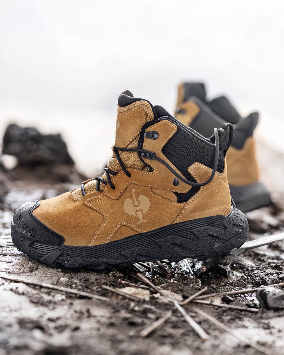 STRAUSS Turin 6-inch Aluminum Toe Work Boot in Almond brown with workwear in a jobsite scene