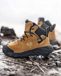 STRAUSS Turin 6-inch Aluminum Toe Work Boot in Almond brown with workwear in a jobsite scene