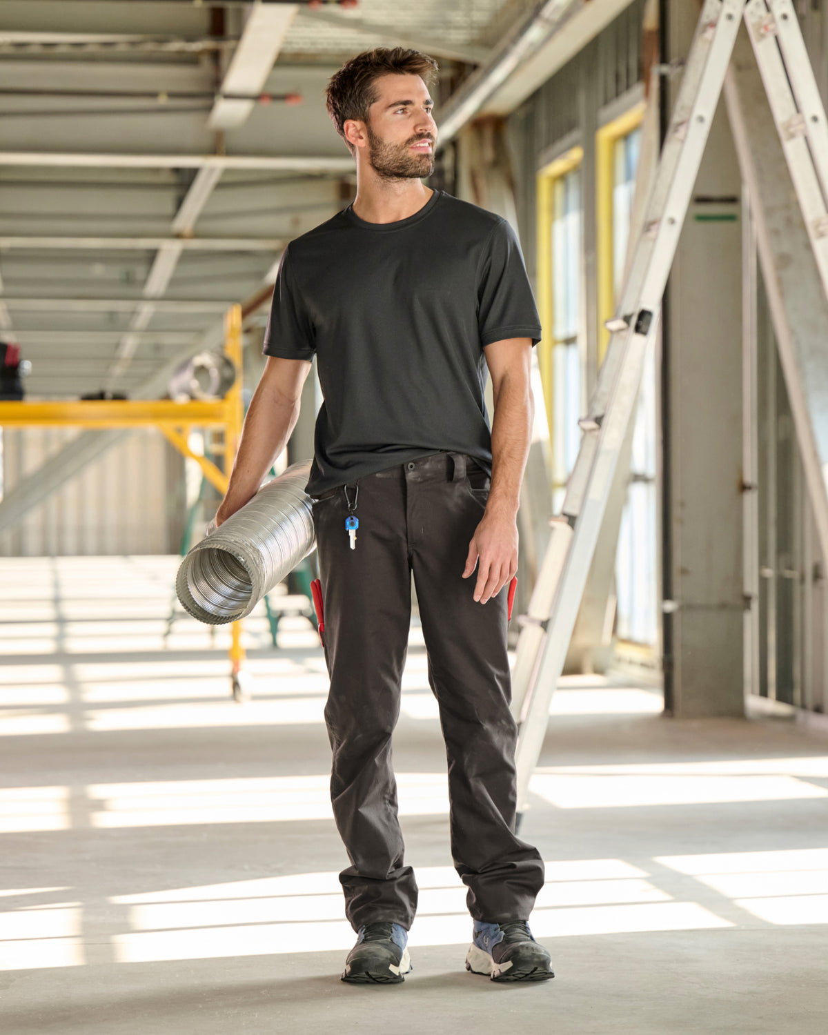 Lifestyle view of STRAUSS 1620 Multipocket Pants in moon gray during work