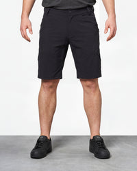 Model wearing Engelbert Strauss utility cargo work shorts in black, showing the fit, length, waistband, and front pocket layout of the black utility cargo work shorts with multiple storage pockets.