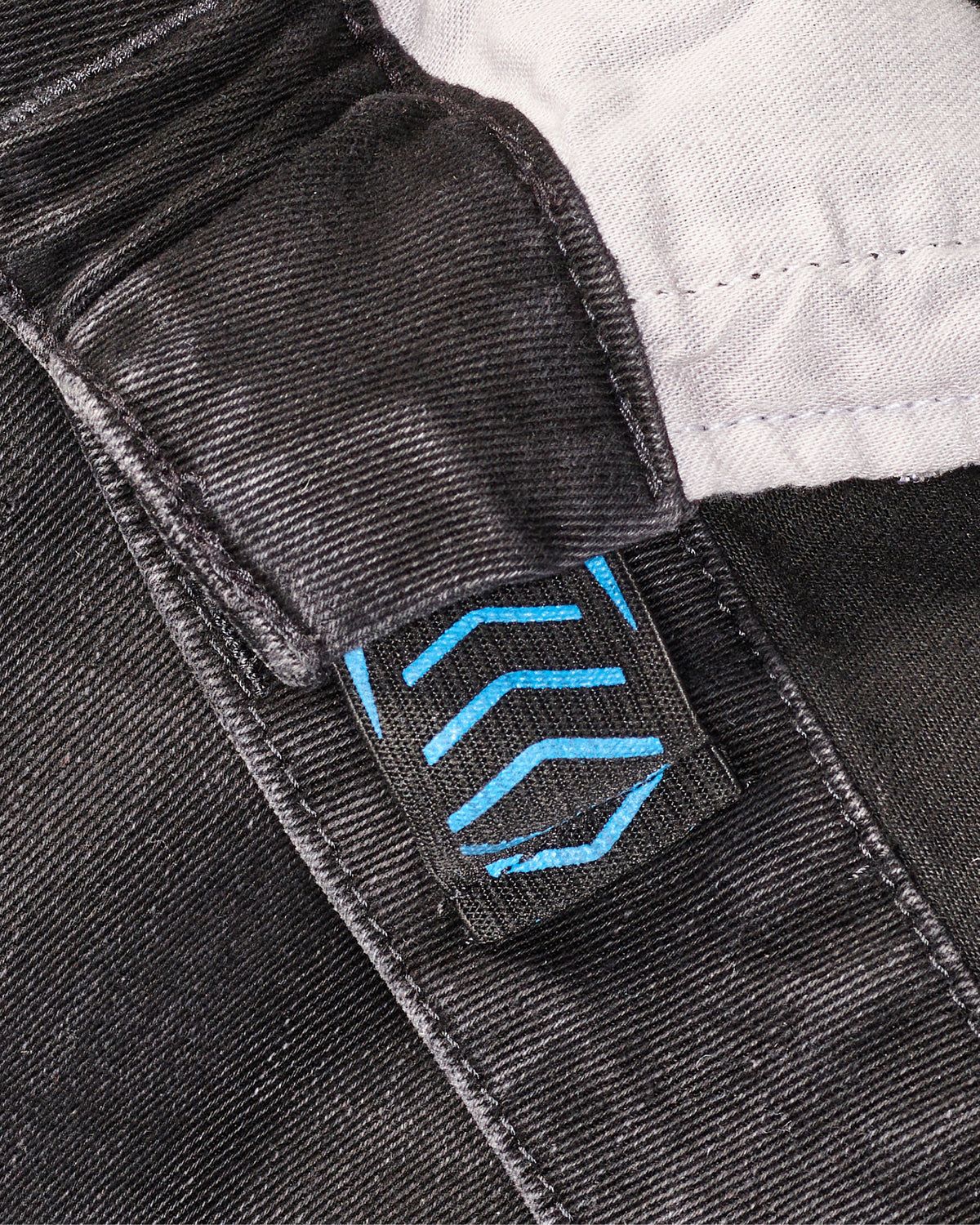Close-up of waistband and stitching on Power Denim 5-Pocket Jeans in blackwashed