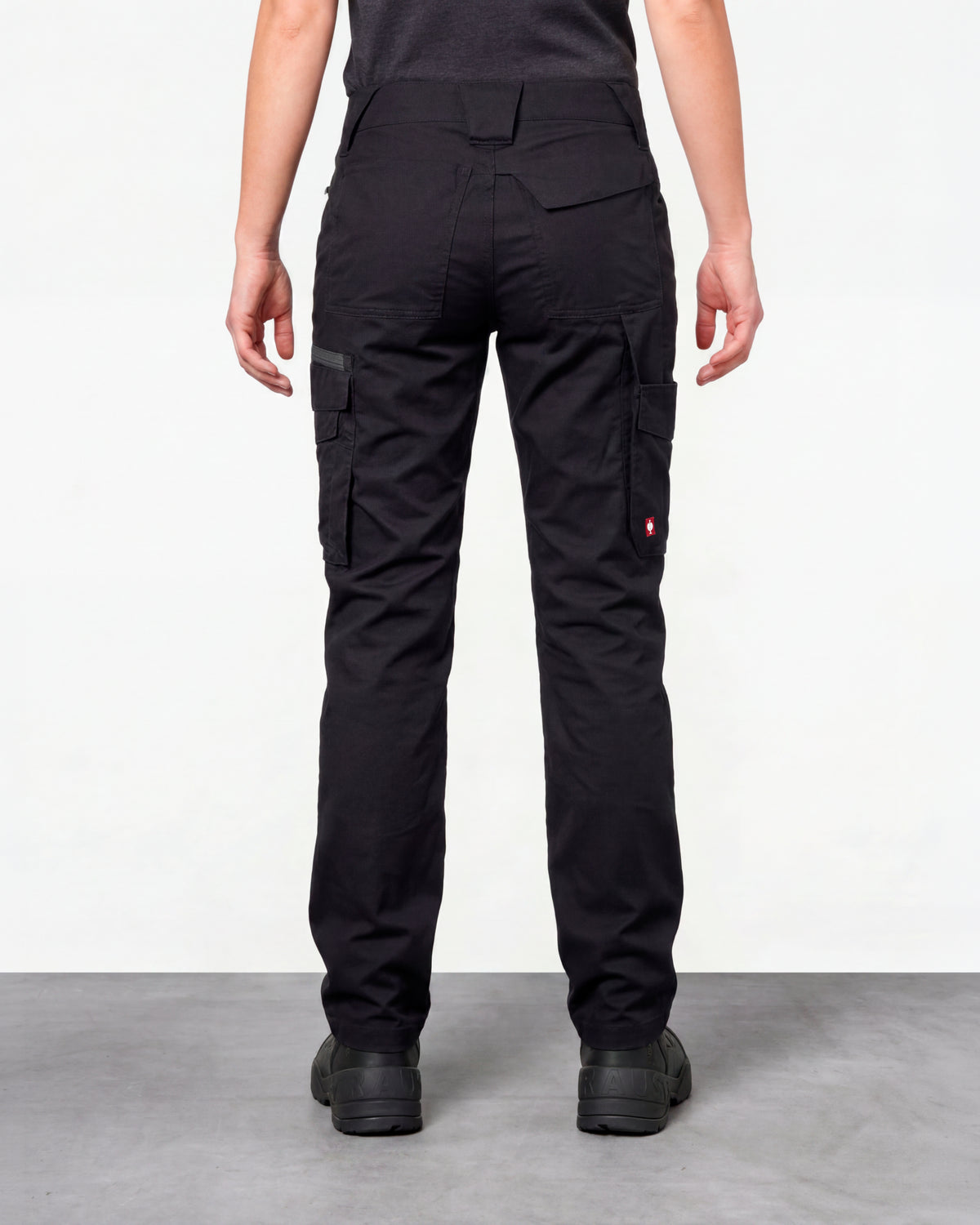 Women's Cargo Work Pants e.s.trail pure in black/carbon gray worn by a model, rear view