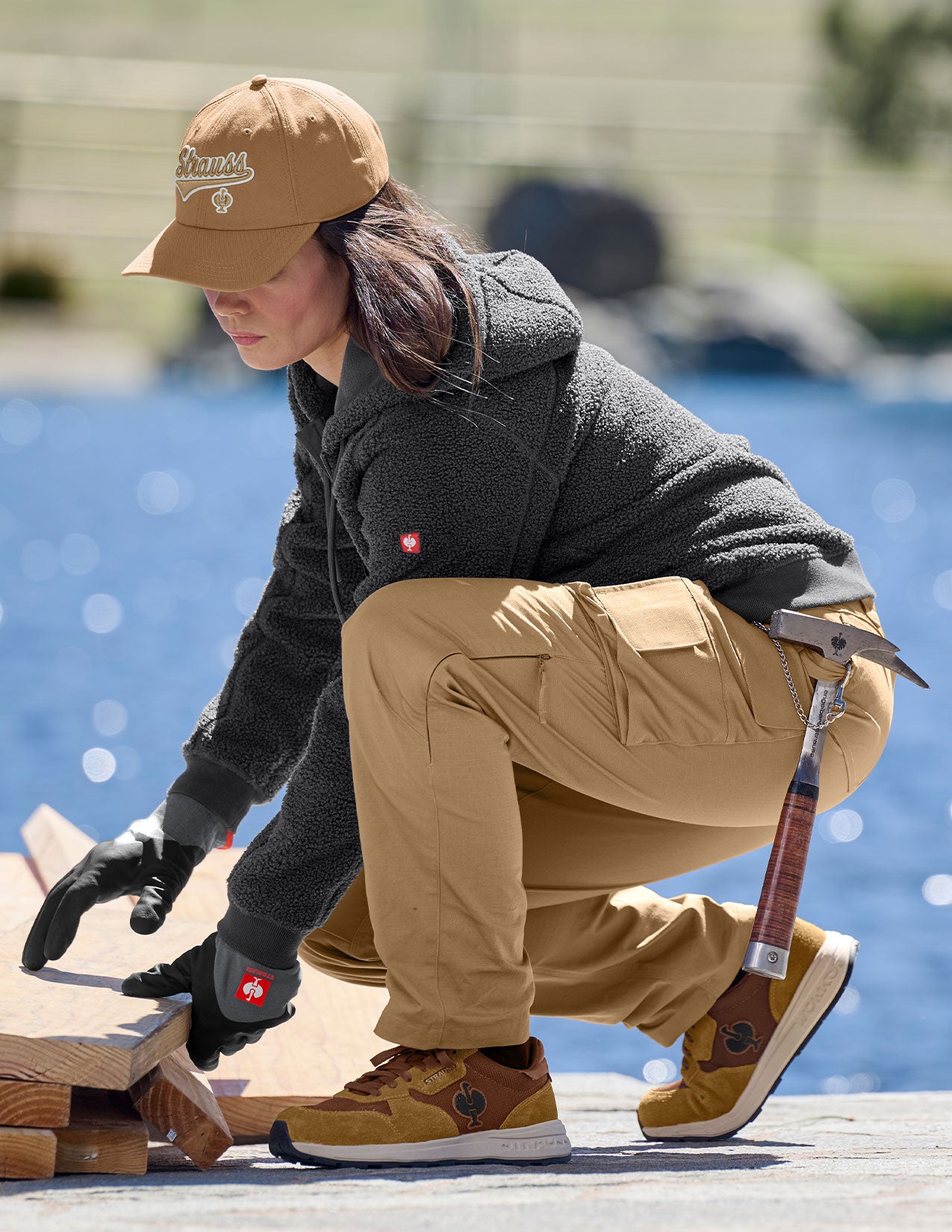 Person in work attire with tools and desertbrown shoes