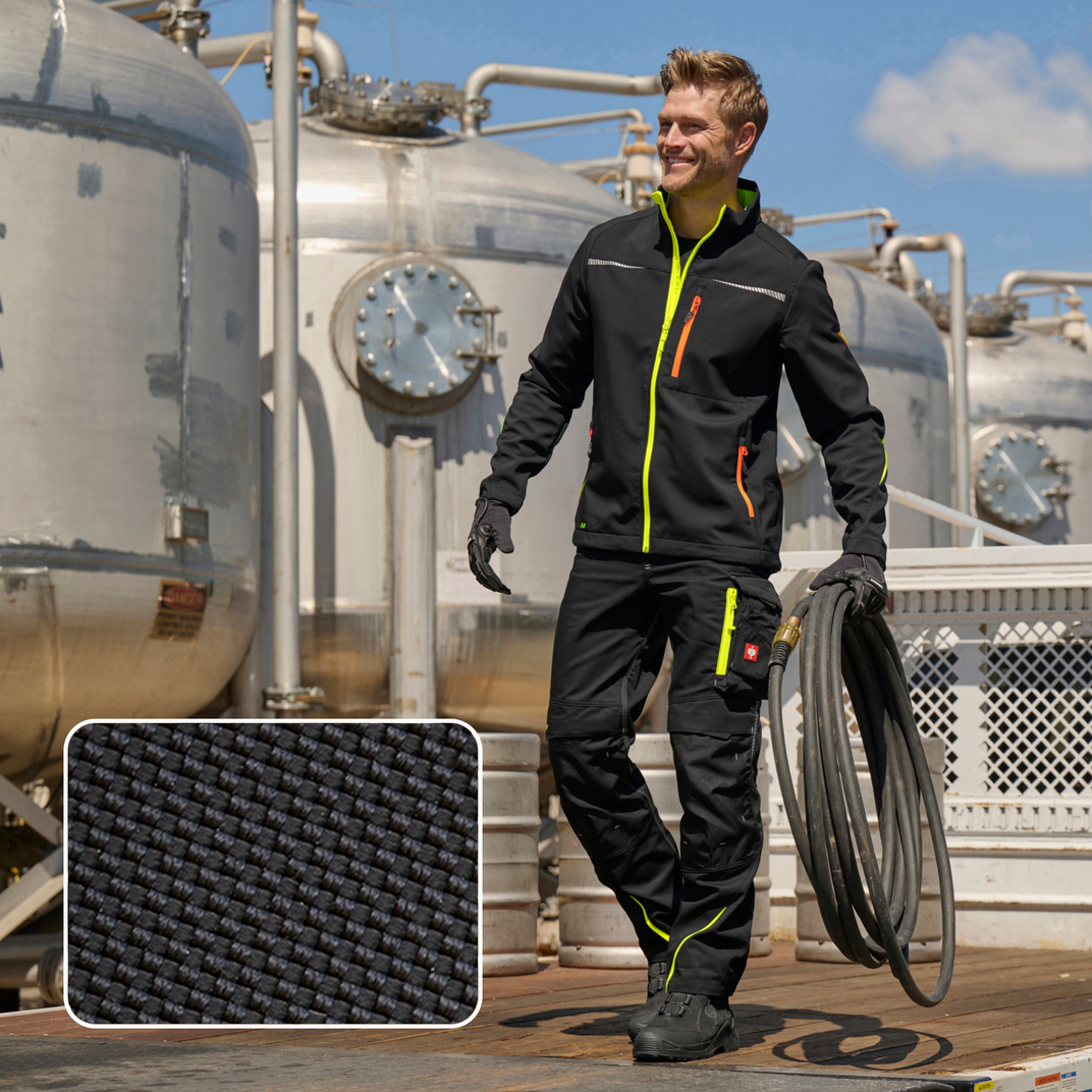 A man wearing motion 2020 workwear, with the Cordura fabric highlighted