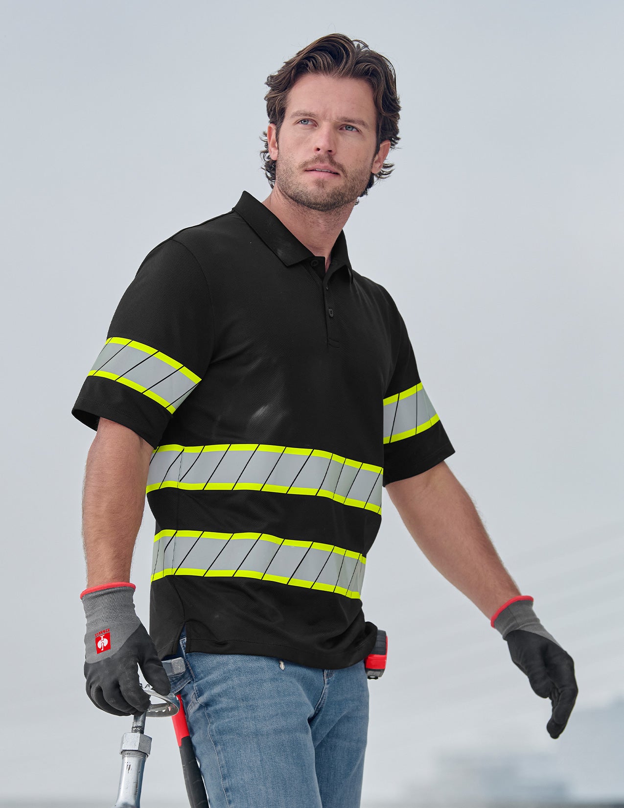 Lifestyle image of Enhanced Visibility Polo in black