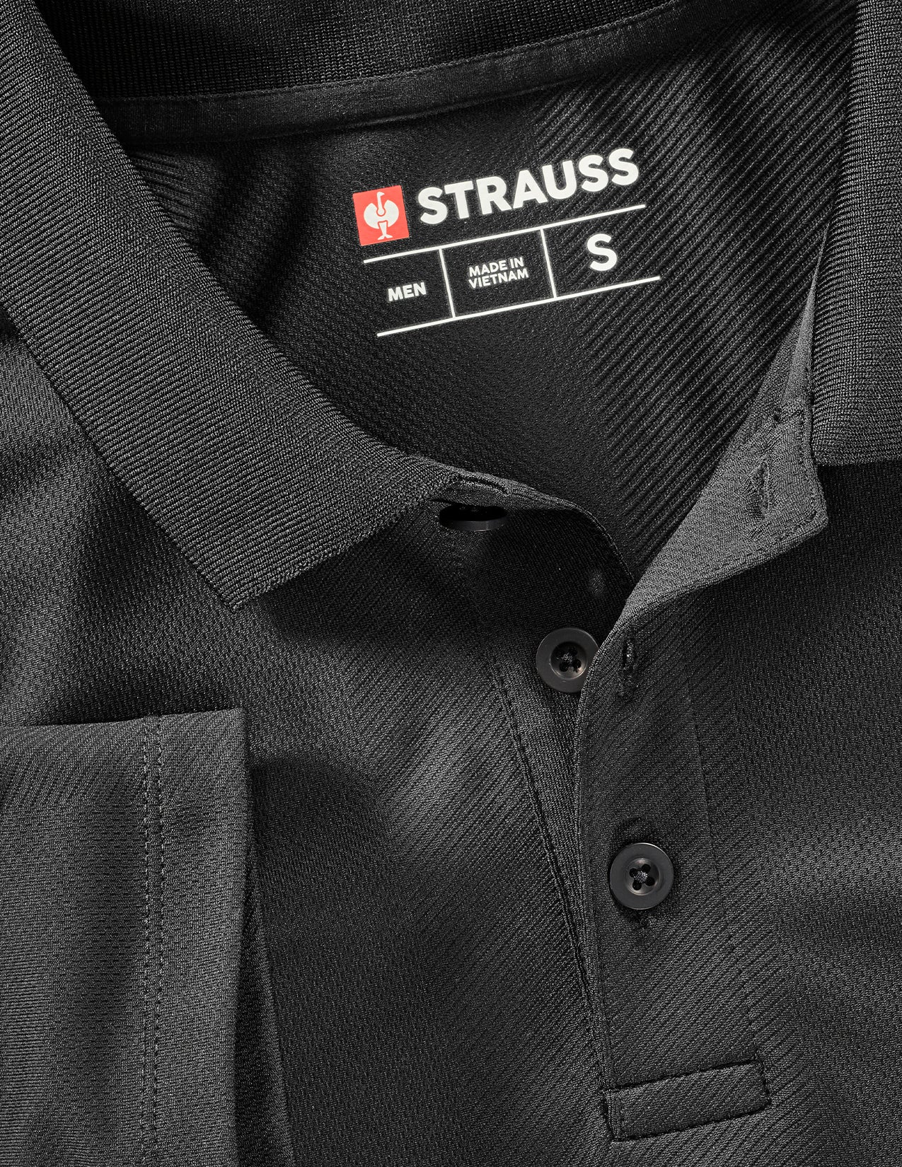 Black polo shirt with Strauss label showing size S