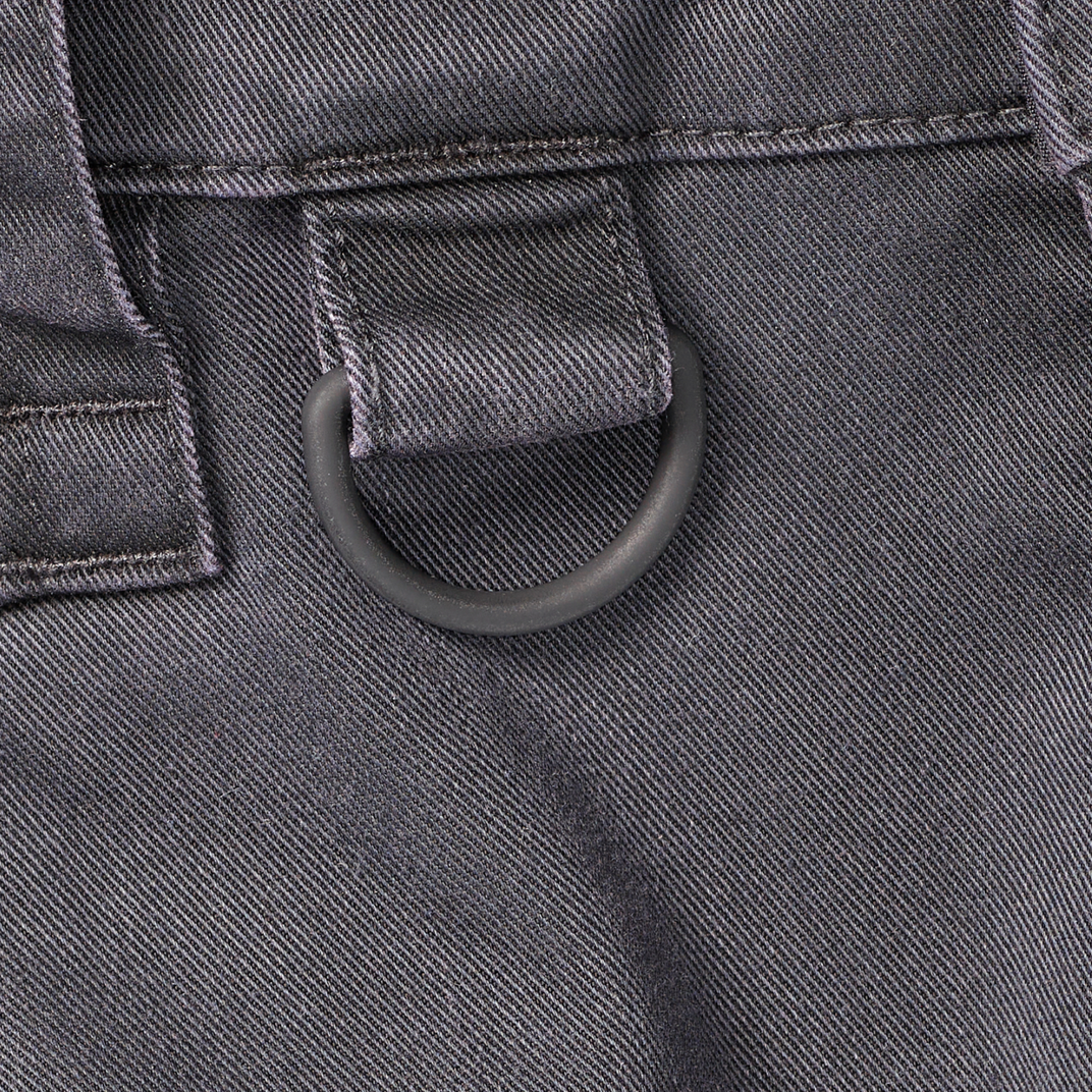 Close-up of a gray twill pants with a D-ring