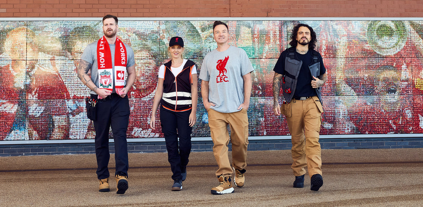 Henning Strauss with people wearing Strauss workwear and Liverpool fanwear