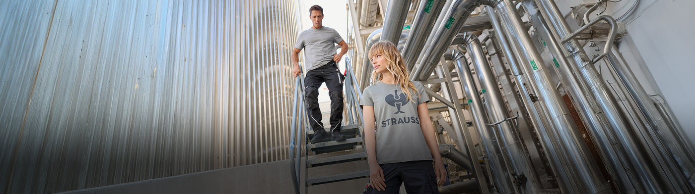 men and woman wearing Strauss workwear