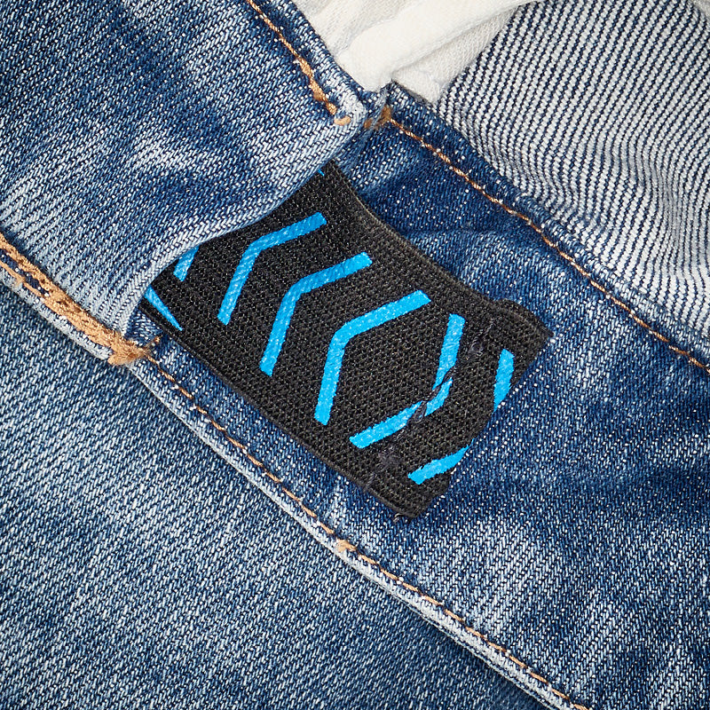 Elastic Flexbelt on power denim 5 pocket jeans.