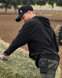 STRAUSS loose fit hoodie in black, worn in casual workwear setting