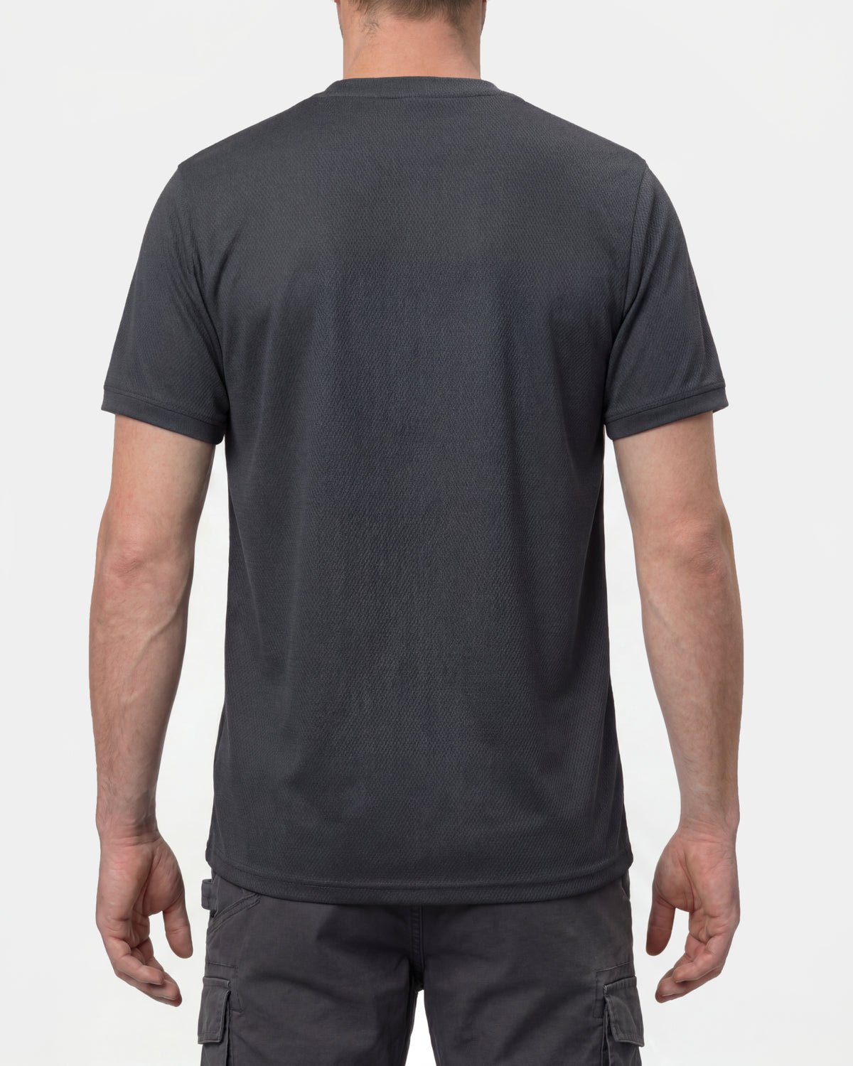 A model wears the STRAUSS Performance T-Shirt in black