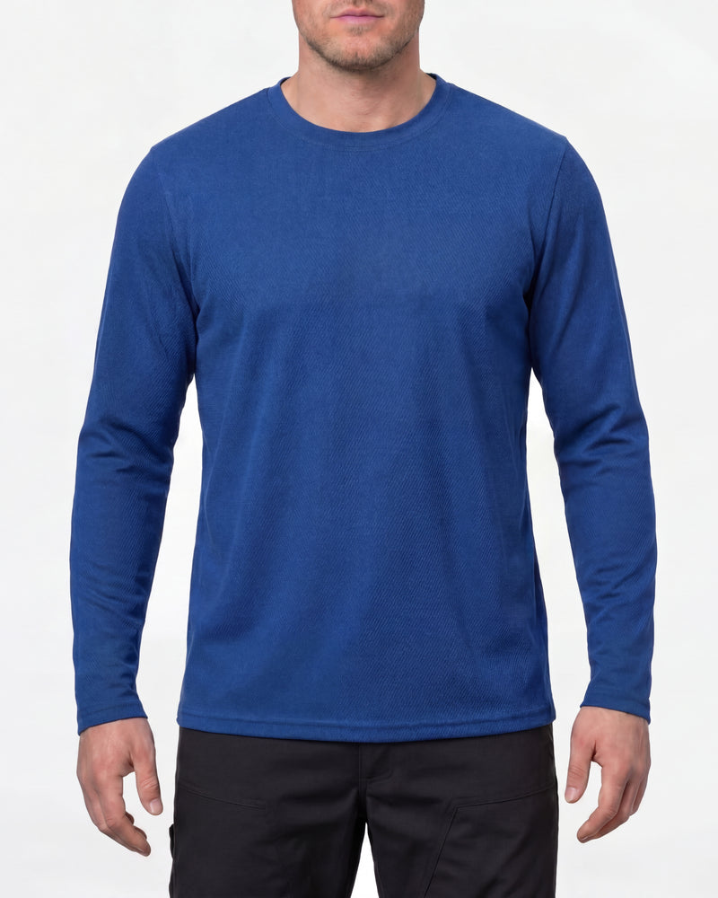 A model wears the STRAUSS Performance Long Sleeve Shirt in royal blue in a studio product scene