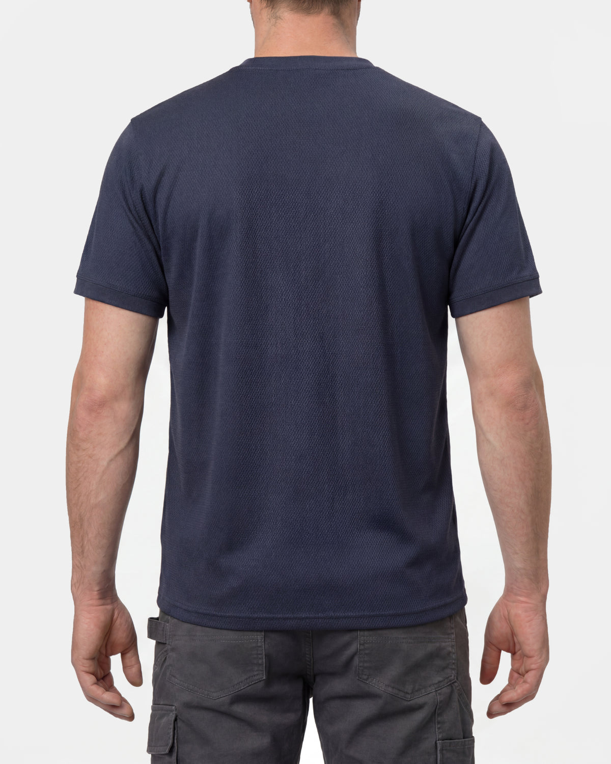 A model wears the STRAUSS Performance T-Shirt in nero blue, showing the shirt fit
