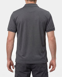 A model wears the STRAUSS Performance Polo Shirt in carbon gray, showing the shirt fit