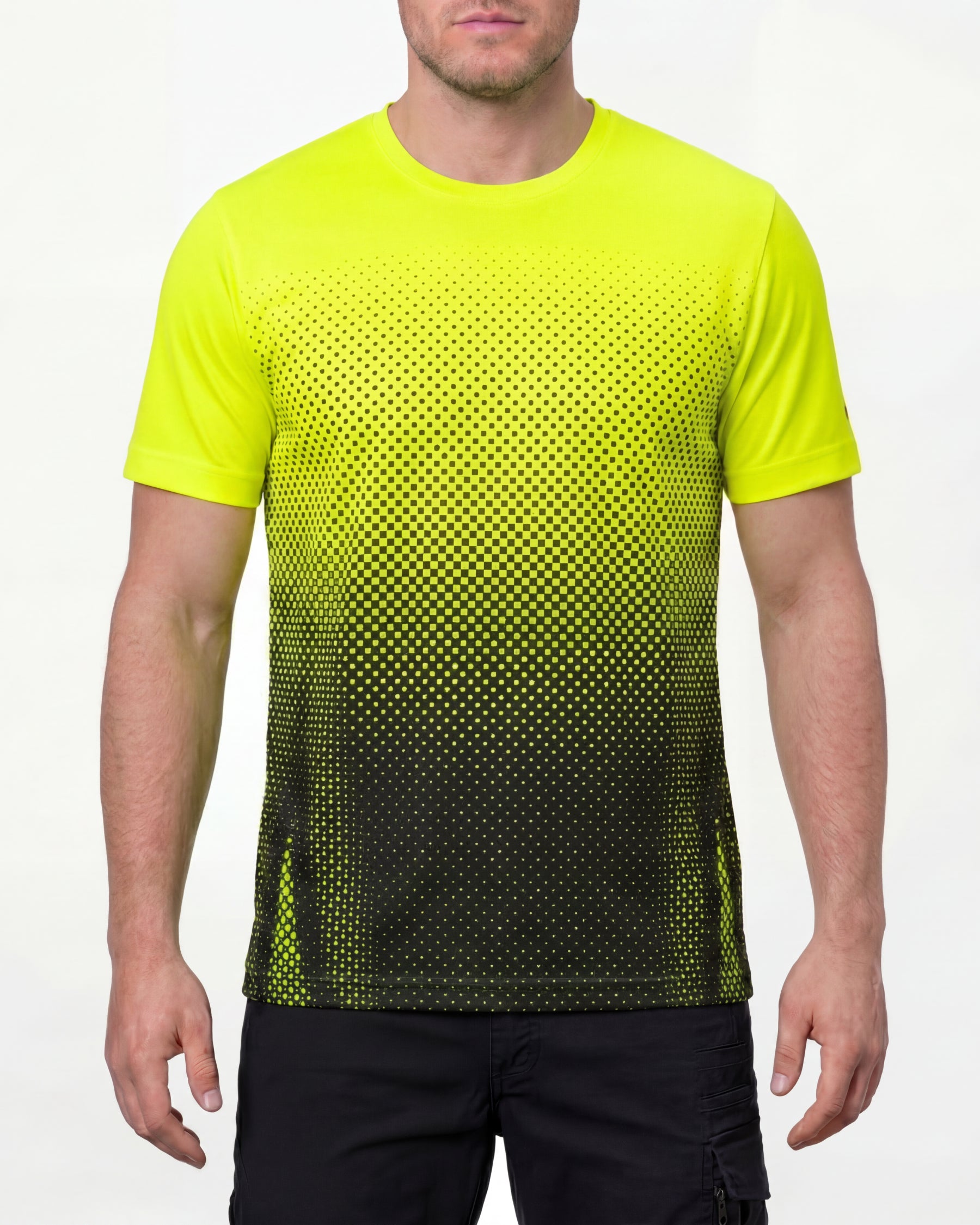 A model wears the STRAUSS Enhanced Visibility Performance T-Shirt e.s.t:aktik in neon yellow and black with black work pants in a high-visibility workwear outfit in a studio product scene
