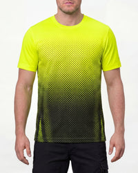 A model wears the STRAUSS Enhanced Visibility Performance T-Shirt e.s.t:aktik in neon yellow and black with black work pants in a high-visibility workwear outfit in a studio product scene