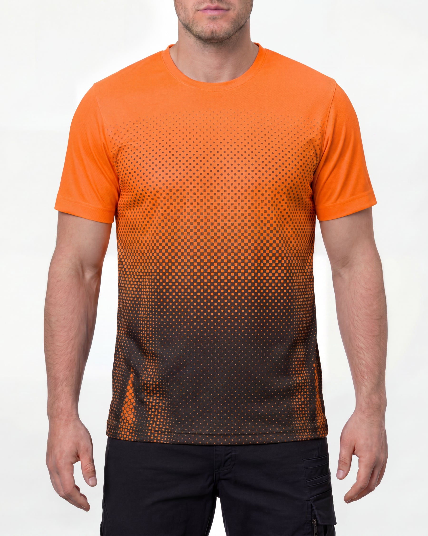 A model wears the STRAUSS Enhanced Visibility Performance T-Shirt e.s.t:aktik in neon orange and black with black work pants in a high-visibility workwear outfit in a studio product scene