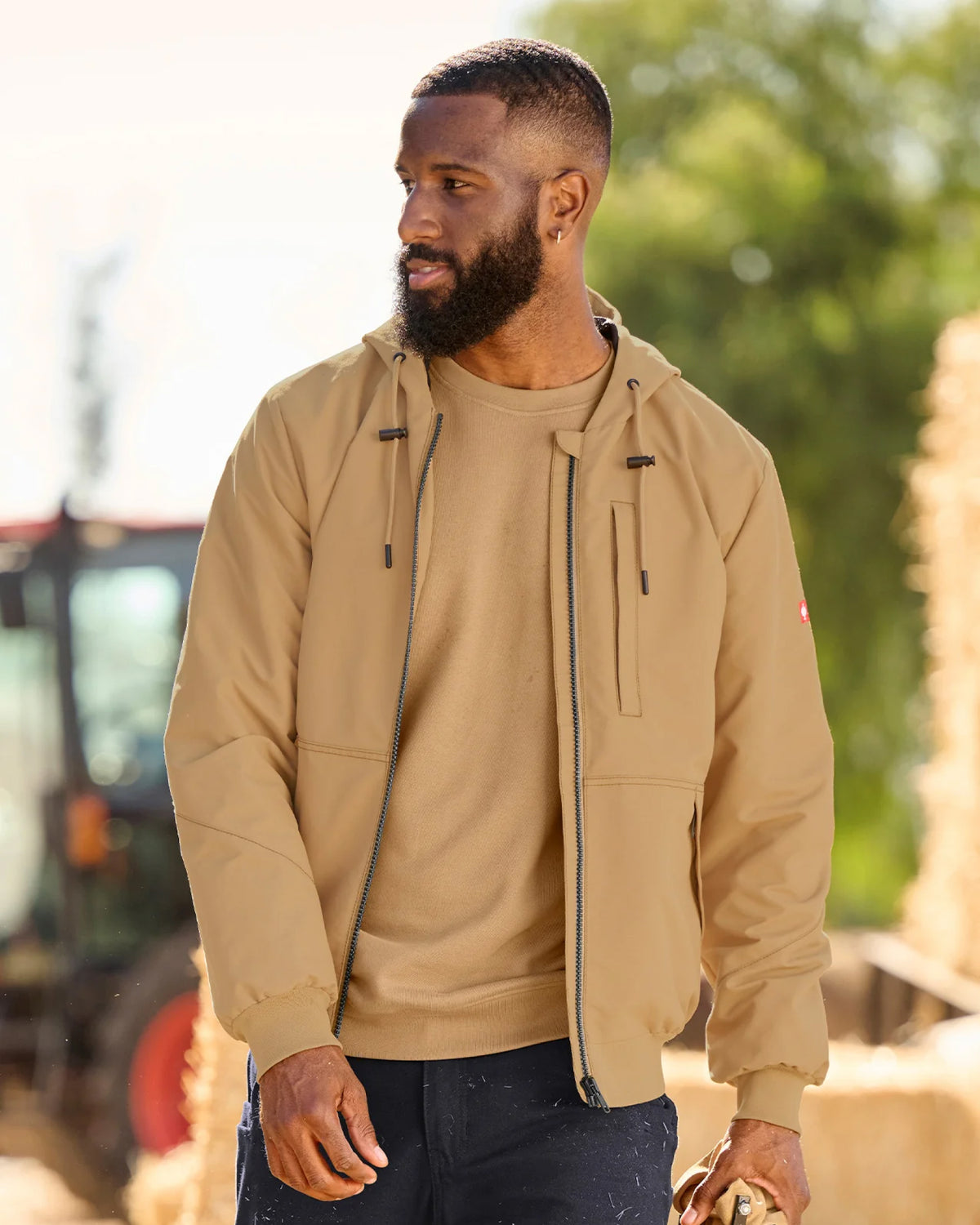 STRAUSS e.s.iconic crew neck sweatshirt in almond brown, worn in casual workwear setting