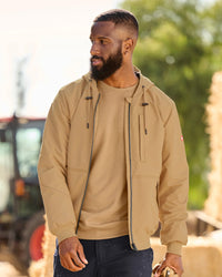 STRAUSS e.s.iconic crew neck sweatshirt in almond brown, worn in casual workwear setting