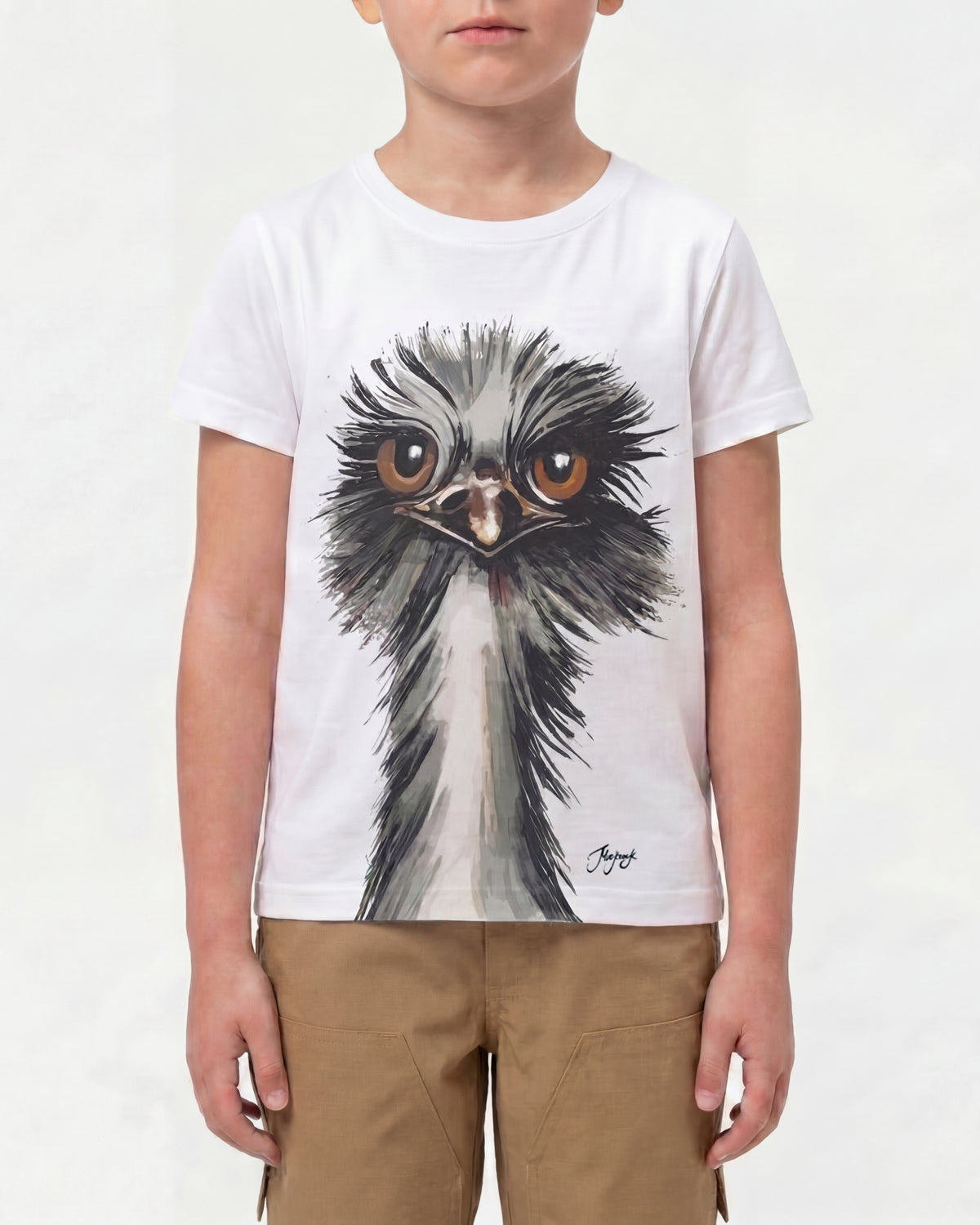 A child wears the Kids' STRAUSS Cotton Stretch T-Shirt in white with casual workwear pants in a studio product scene