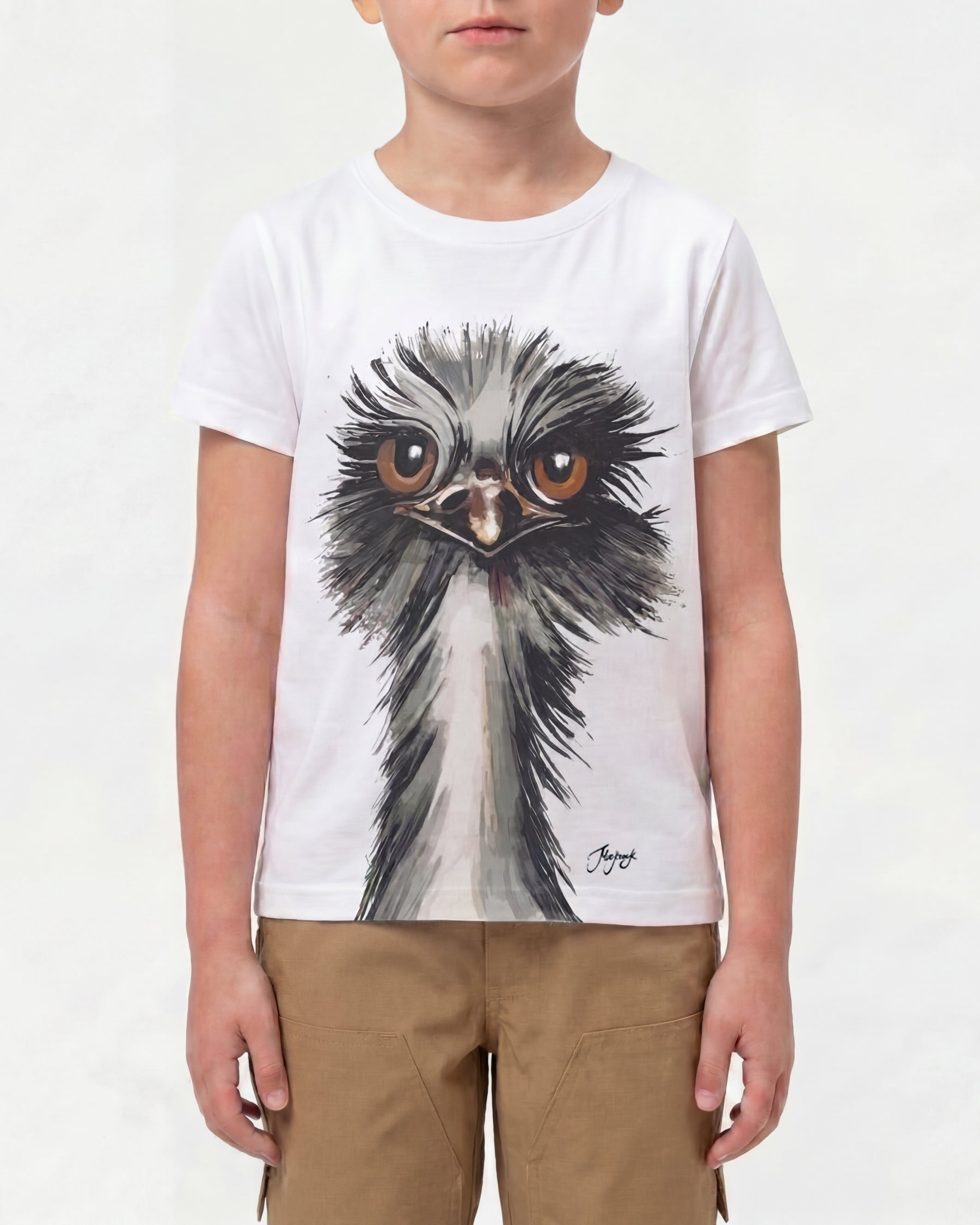 A child wears the Kids' STRAUSS Cotton Stretch T-Shirt in white with casual workwear pants in a studio product scene