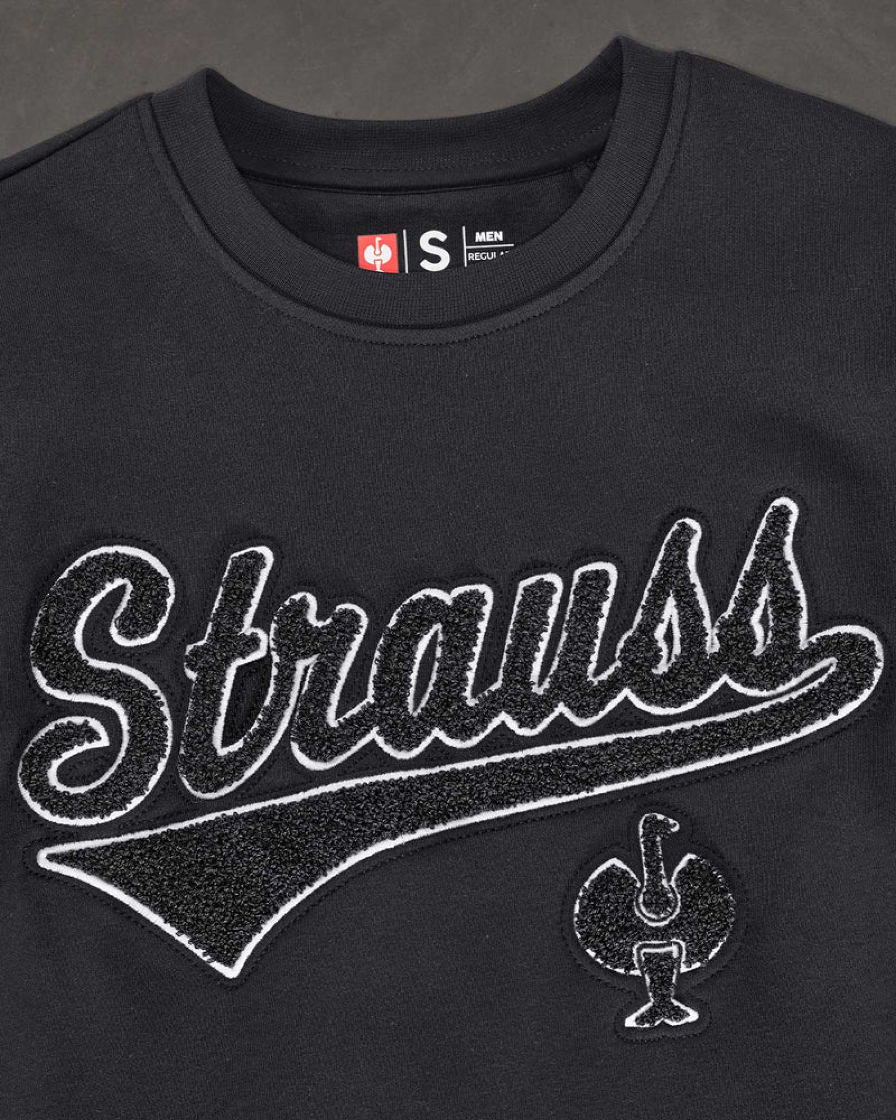 STRAUSS e.s.e:pic artwork crew neck sweatshirt in black, close-up of graphic artwork detail