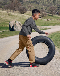Kids' STRAUSS e.s.e:pic artwork crew neck sweatshirt in carbon gray, worn in workwear outfit