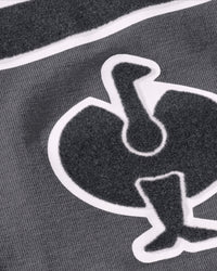 Close-up of the STRAUSS artwork print on the carbon gray Kids' STRAUSS Artwork T-Shirt e.s.e:pic