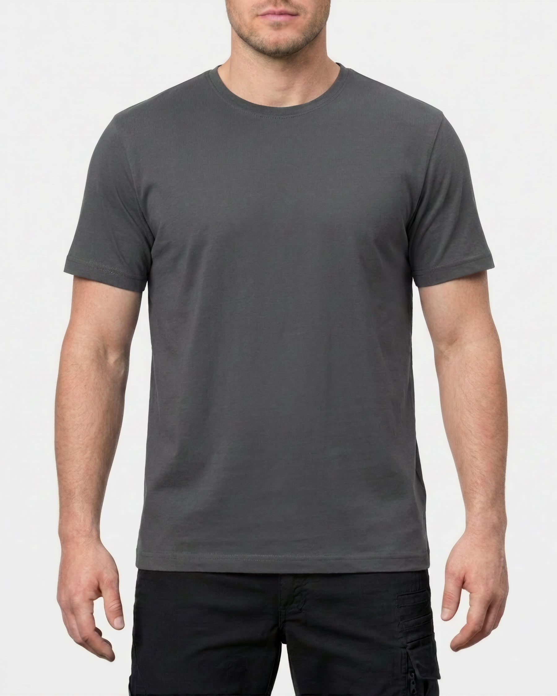 A model wears the STRAUSS Cotton Stretch T-Shirt in carbon gray with in a studio product scene