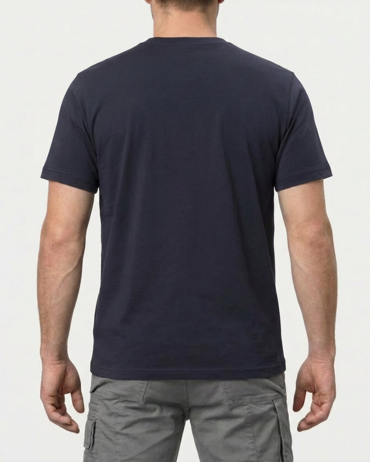 A model wears the STRAUSS Cotton Stretch T-Shirt in nero blue, showing the shirt fit