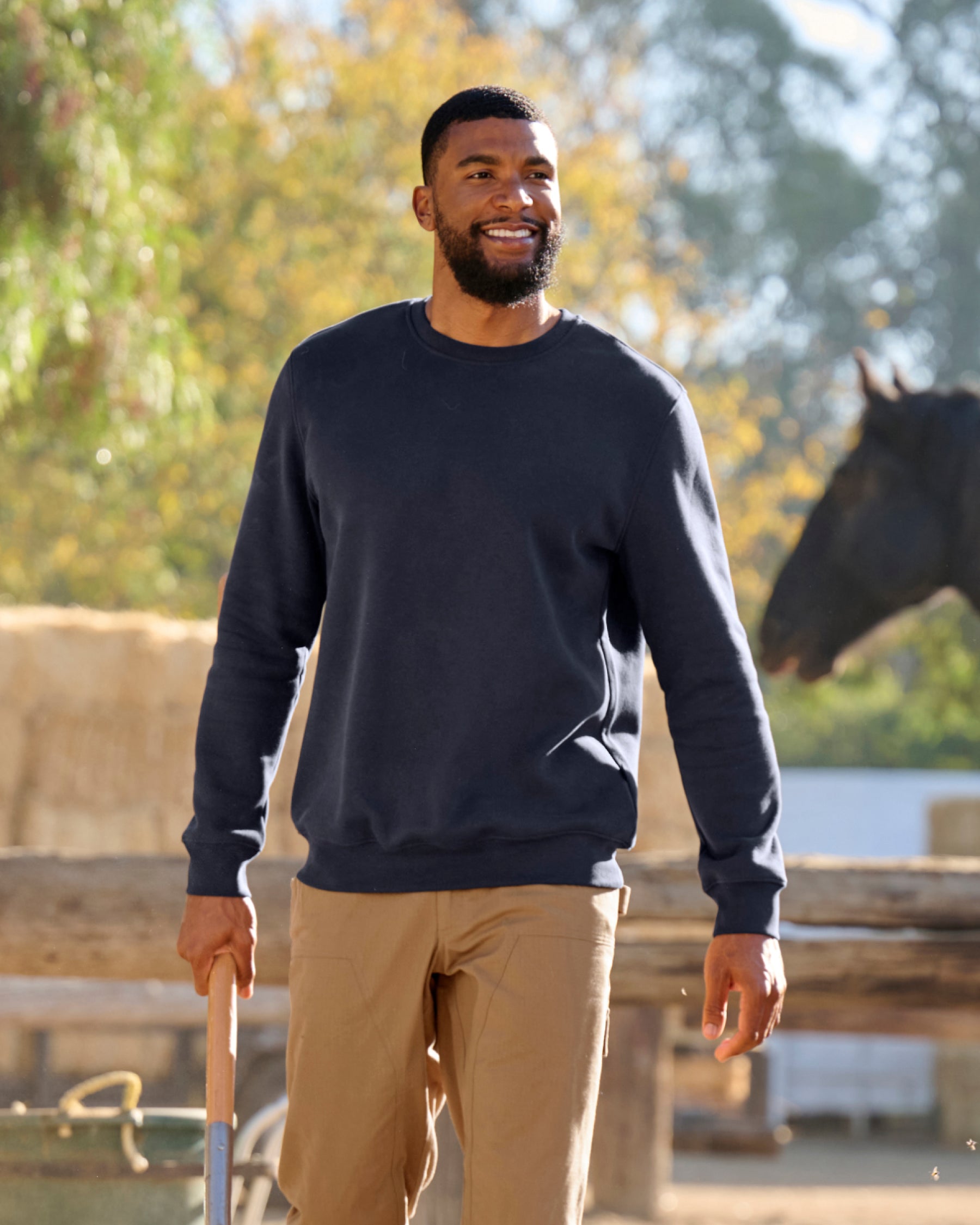 STRAUSS cotton-poly crew neck sweatshirt in nero blue, worn in lifestyle setting