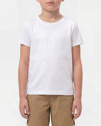A kid wears the Kids' STRAUSS Cotton Stretch T-Shirt in white with kids' work pants in a studio product scene