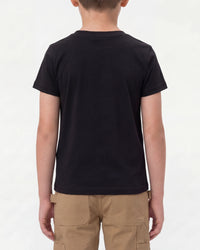 A child wears the Kids' STRAUSS Cotton Stretch T-Shirt in black with kids' work pants and work boots, showing the shirt fit