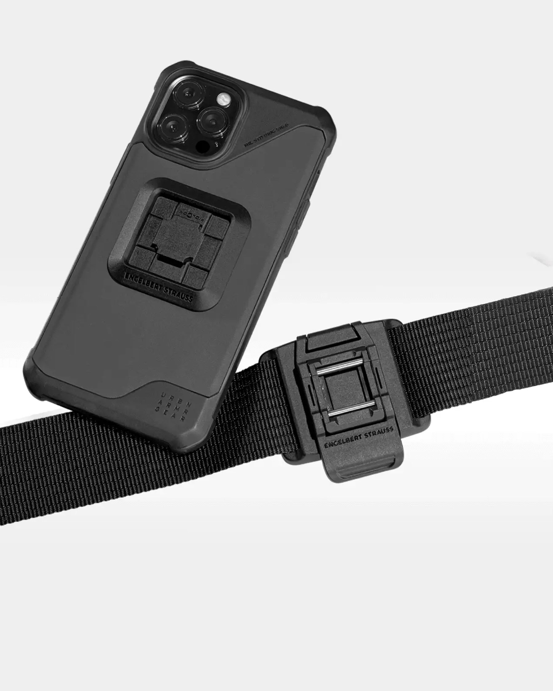 Close-up of a smartphone connected on the black STRAUSS e.s.tool concept multi holder.
