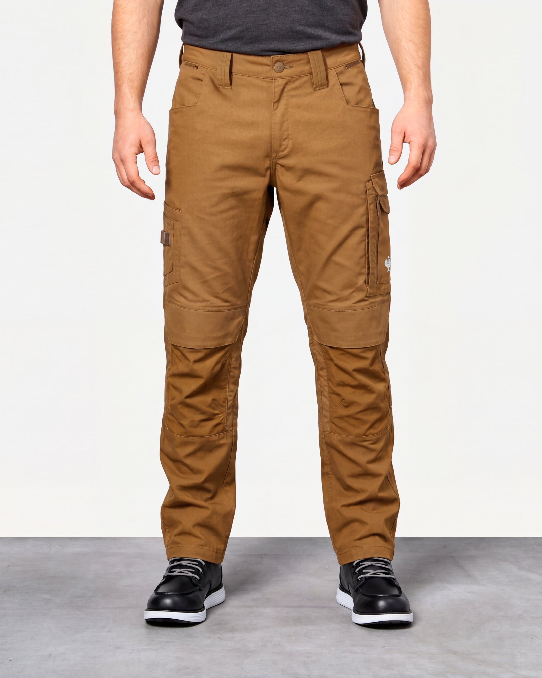 Work Pants e.s.concrete light in desert brown worn by a model, front view