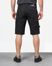 Alternate model view of Engelbert Strauss e.s. concrete light shorts in black, showing the side and back fit with visible utility pocket placement and workwear construction.