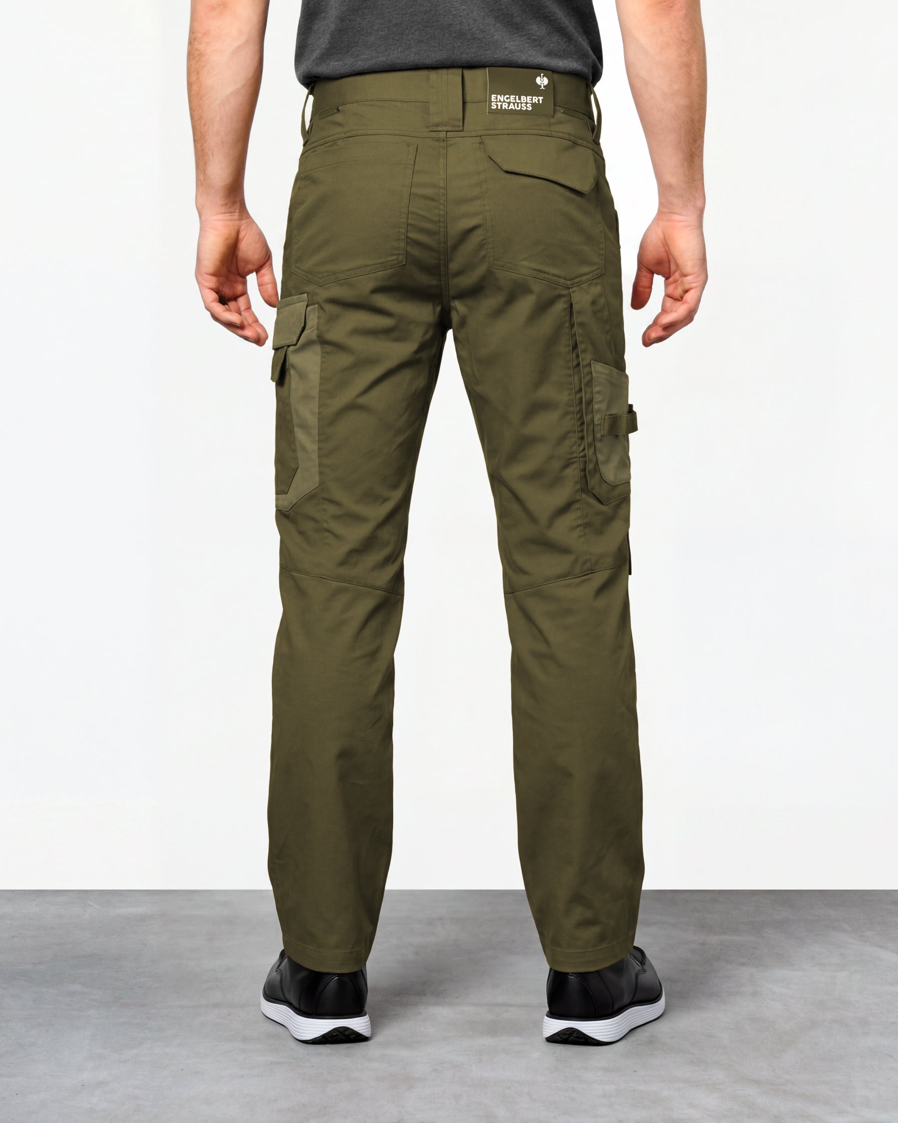 Work Pants e.s.concrete light in mud green and stipa green worn by a model, rear view