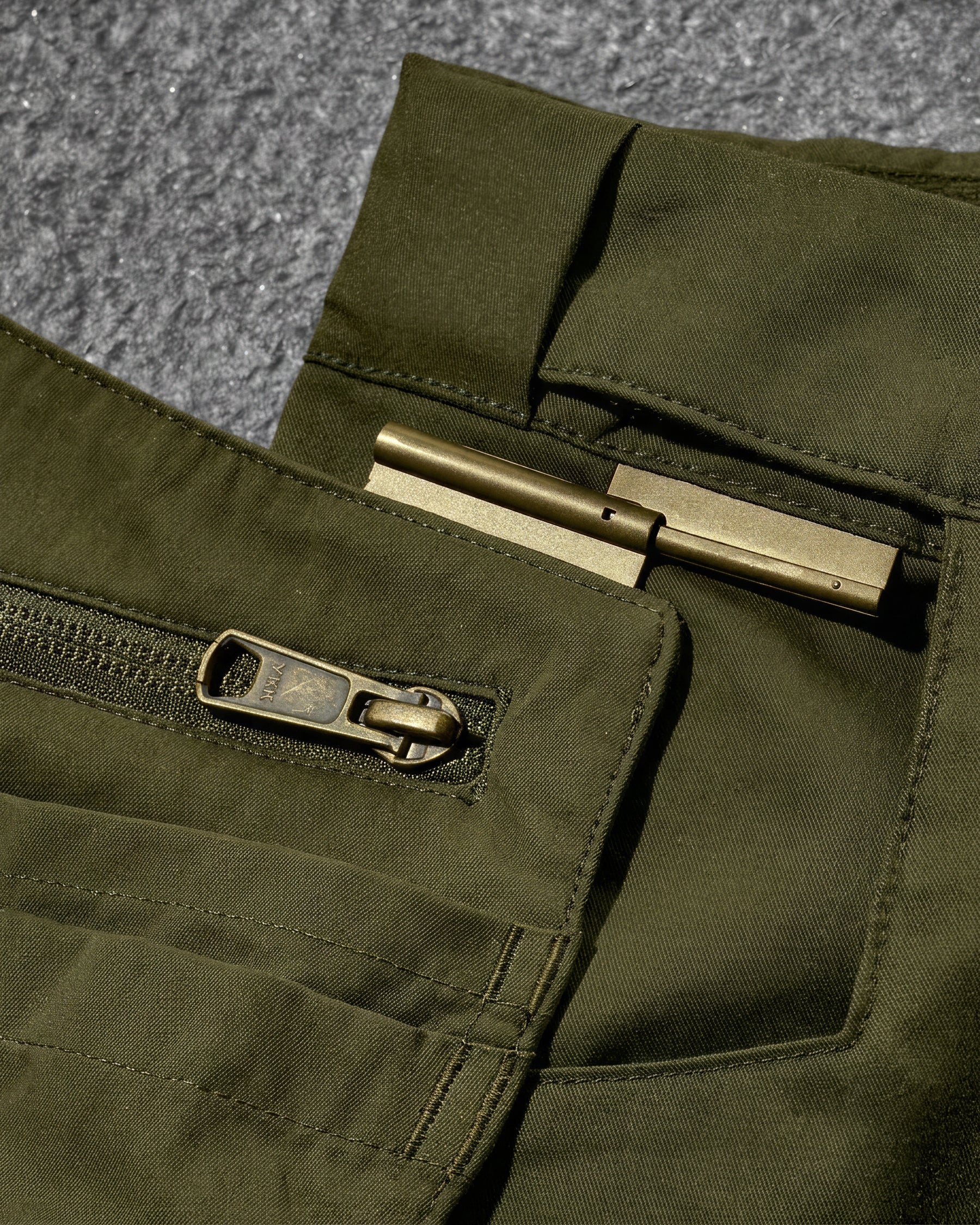 Close-up of fabric and seam construction on Work Pants e.s.concrete light in mud green and stipa green