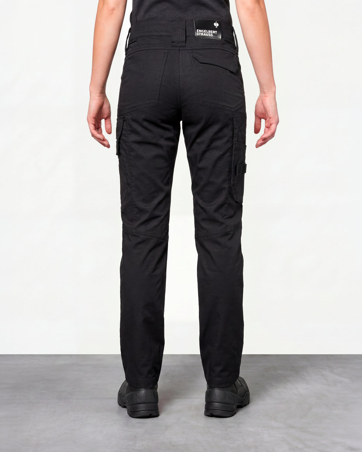 Women's Work Pants e.s.concrete light in black worn by a model, rear view
