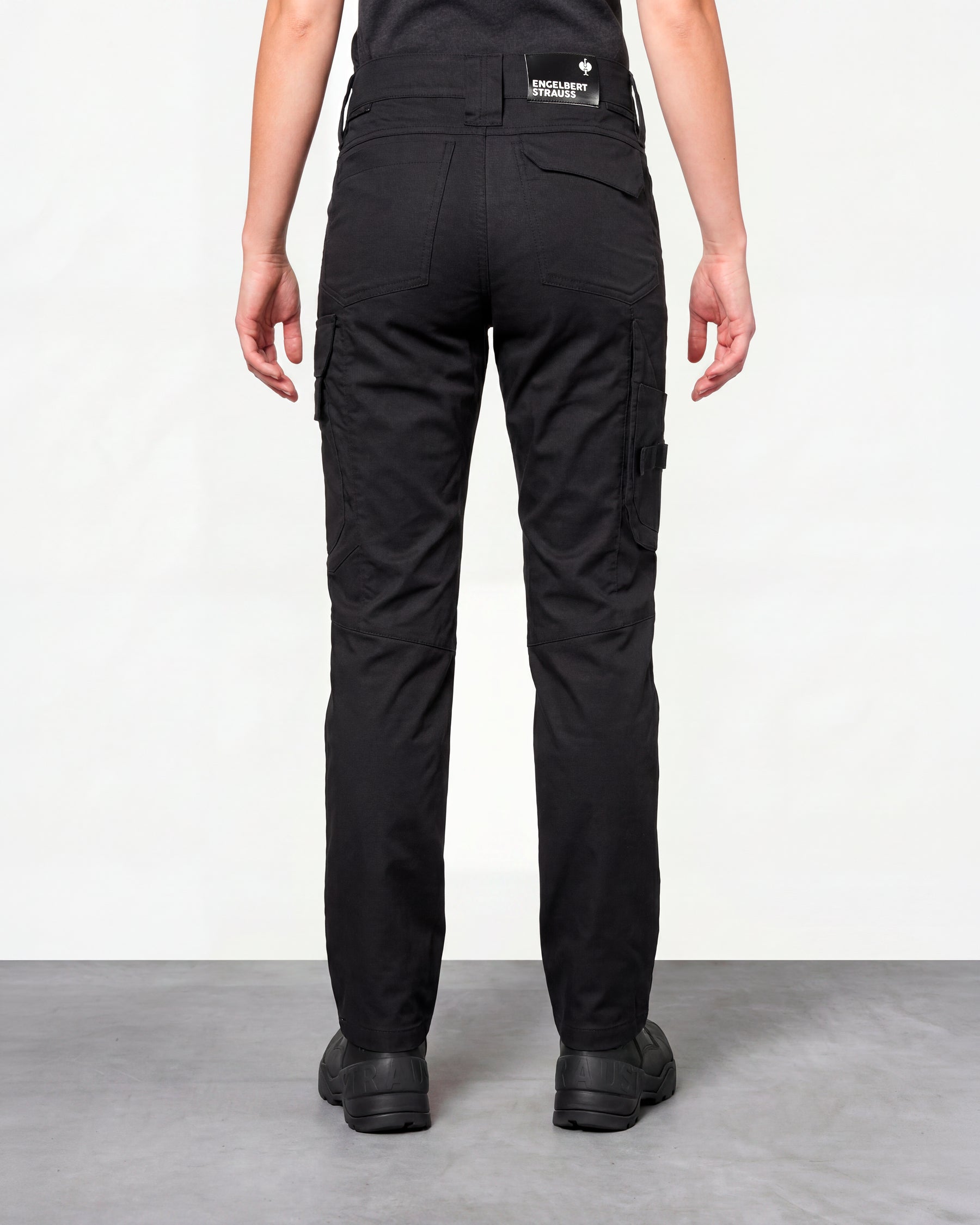 Women's Work Pants e.s.concrete light in black worn by a model, rear view