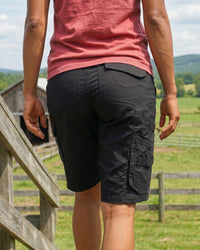 Engelbert Strauss women's e.s. concrete light shorts in black in an additional lifestyle view, emphasizing the everyday utility, above-knee length, and rugged styling.